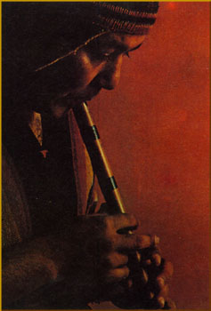 Ind�gena tocando flauta
